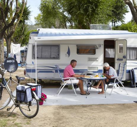 Couple eating at a trailer park in Spain