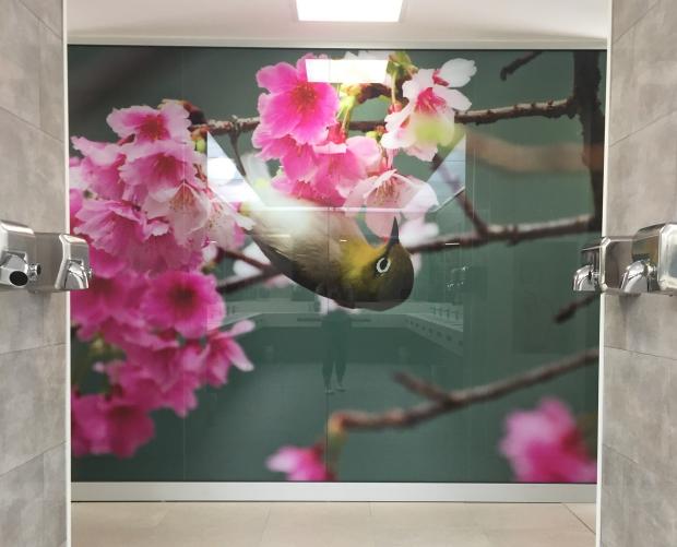 Decoration on the wall of a bird and flowers